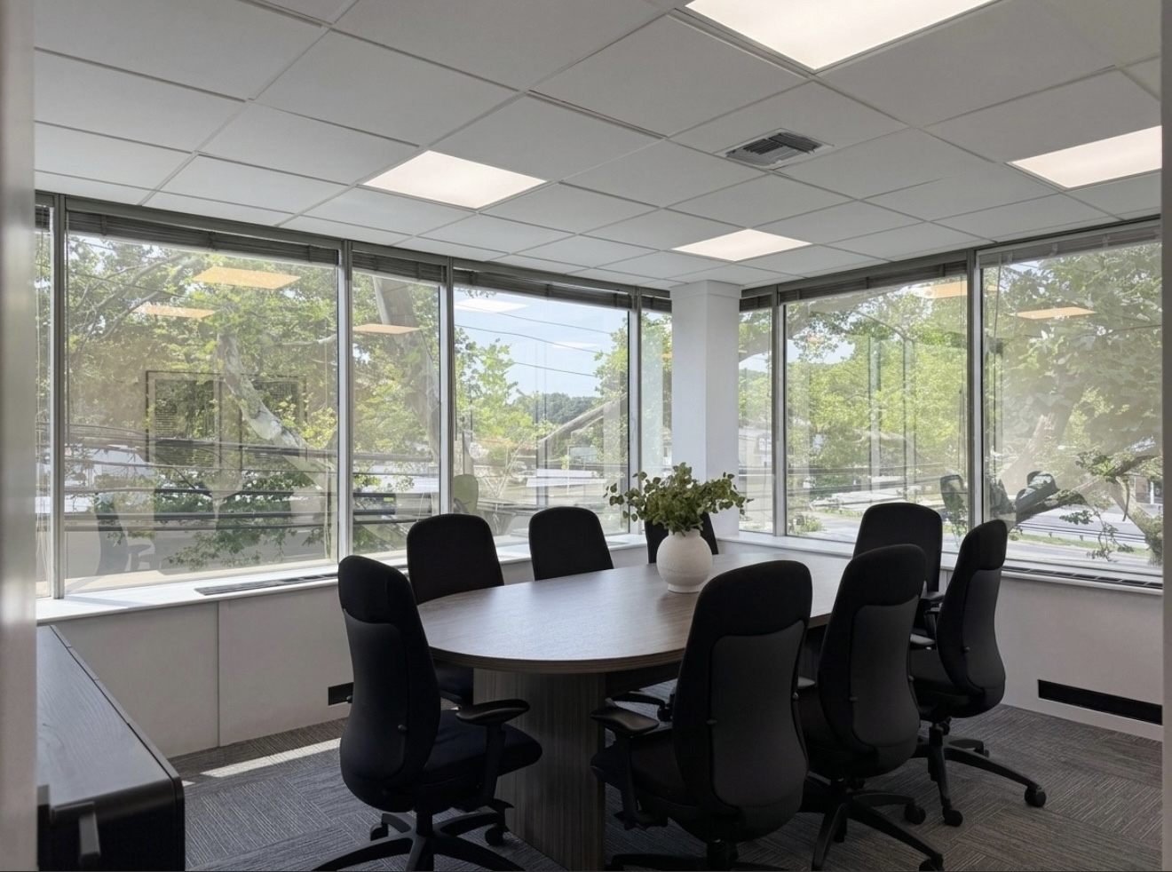 Bright corner conference room in Suite 305